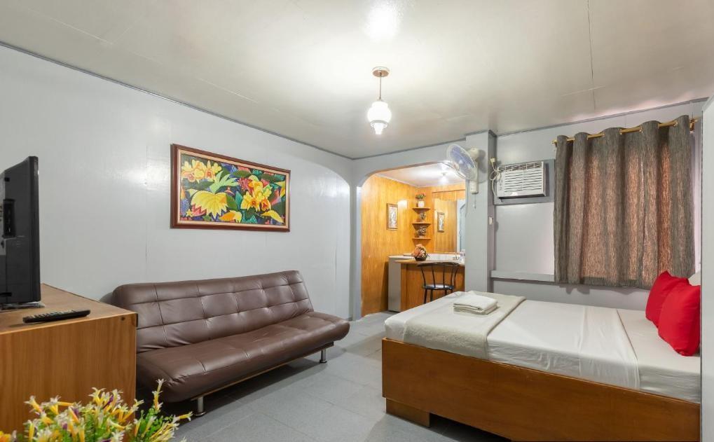 Oyo 722 Slouch Hat Inn Манила Экстерьер фото